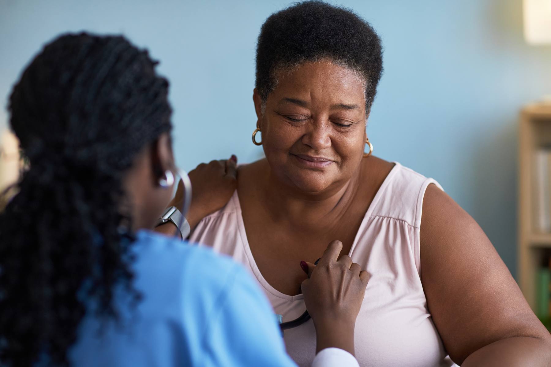 Doctor listening to a patient's heart