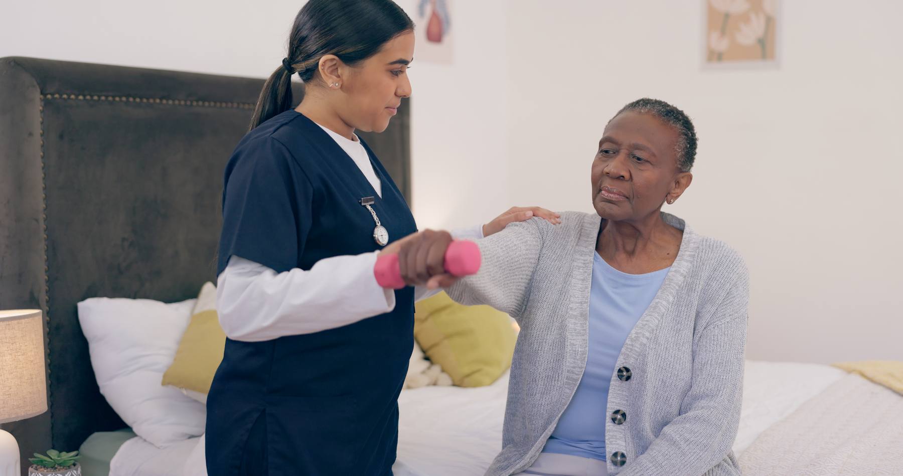 Caregiver assisting a client with exercise