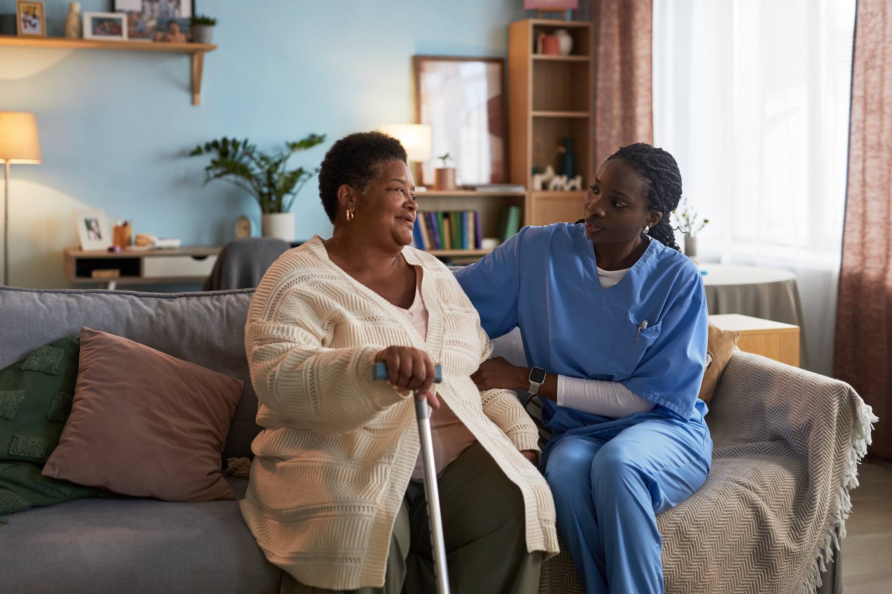 Caregiver supporting a client at home